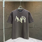 AMIRI Overlapped Stacked Logo Crew‑Neck Short‑Sleeve T‑Shirt