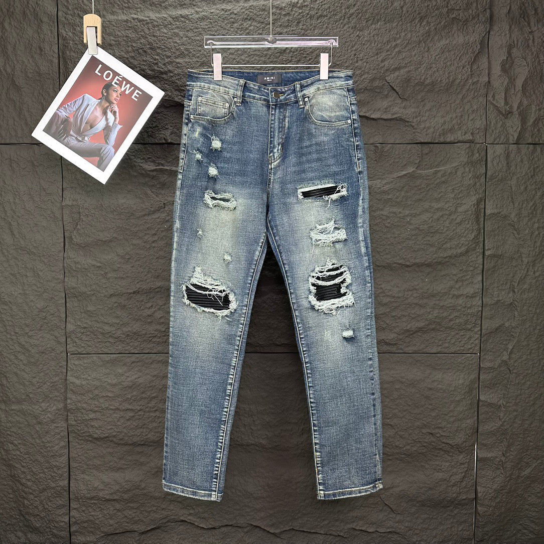AMIRI Ripped Ribbed Patch Slim‑Fit Denim Jeans