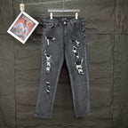 AMIRI Studded Multi‑Rip Distressed Slim‑Fit Denim Jeans