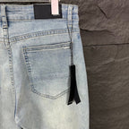 AMIRI Black Ribbed Patch Distressed Slim‑Fit Denim Jeans