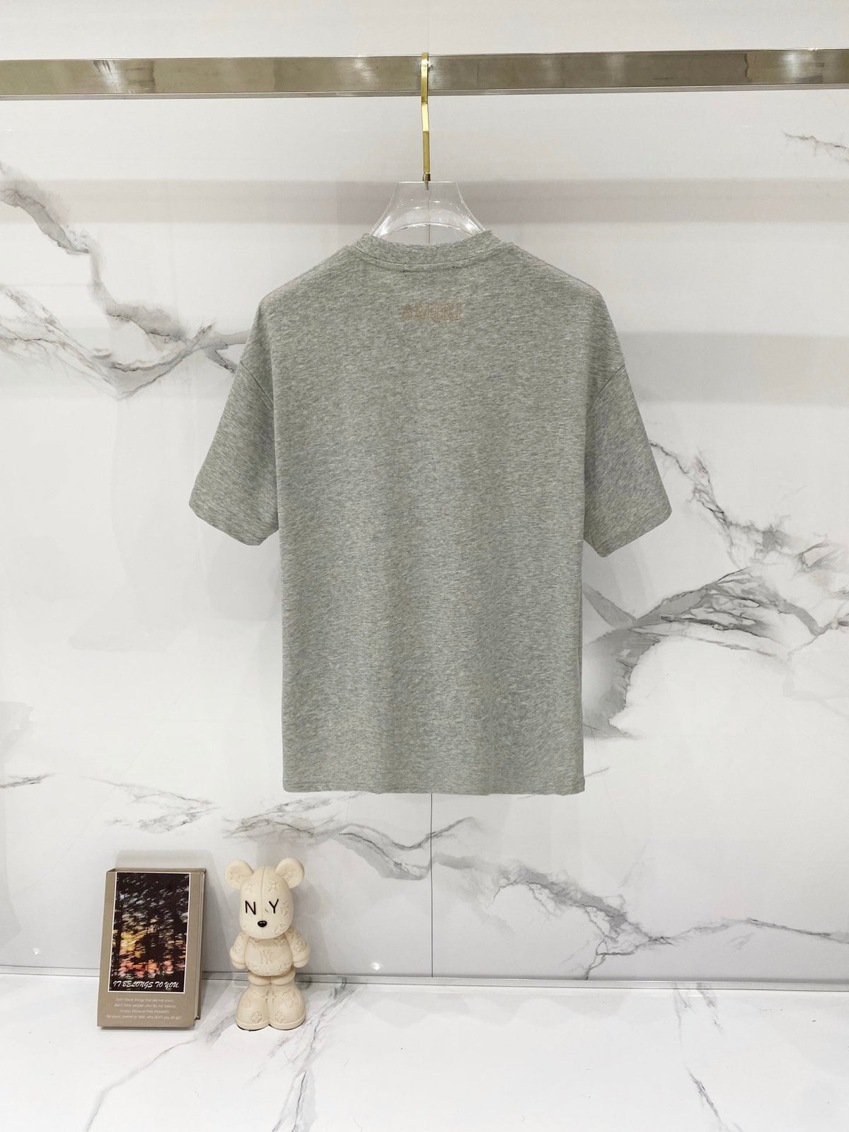 AMIRI Chest Pocket Subtle Embossed Graphic Crew Neck Short‑Sleeve T‑Shirt