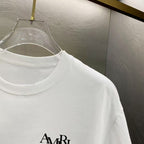 Amiri Interlocking Monogram Chest Graphic Crew‑Neck Short‑Sleeve T‑Shirt
