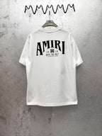 AMIRI Gothic Monogram Chest Graphic Crew Neck Short‑Sleeve T‑Shirt