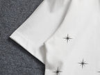 AMIRI MA Logo Gradient Starburst Print Crew Neck Short‑Sleeve T‑Shirt