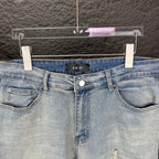 AMIRI Blue Ribbed Patch Diamond‑Rip Distressed Slim‑Fit Denim Jeans