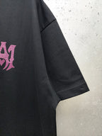 AMIRI Gothic Monogram Chest Graphic Crew Neck Short‑Sleeve T‑Shirt