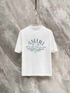 Amiri Arts District Multi‑Line Text Graphic Crew‑Neck Short‑Sleeve T‑Shirt