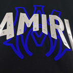 AMIRI Layered Metallic‑Effect Letter Graphic Short‑Sleeve Tee