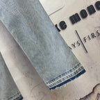 AMIRI Ornamental Stud Embellished Light‑Wash Flared Denim Jeans