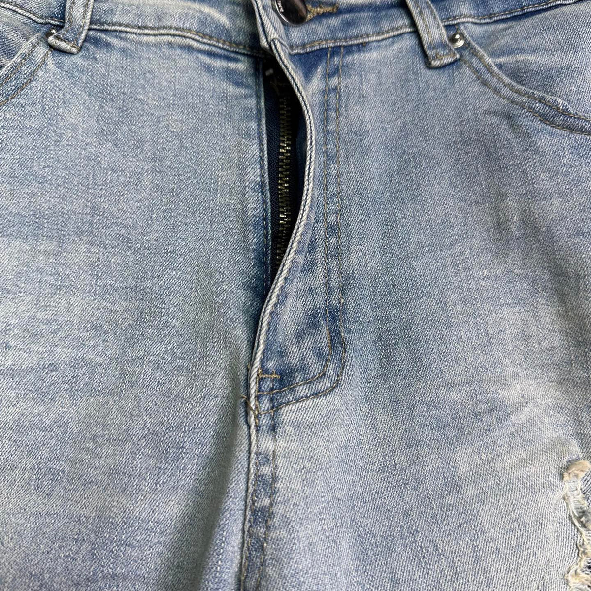 AMIRI Black Ribbed Patch Distressed Slim‑Fit Denim Jeans