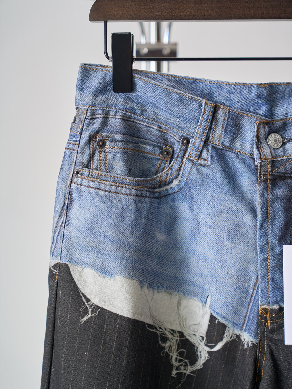 Acne Studios Spliced Deconstructed Wide‑Leg Denim Trousers