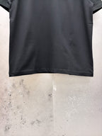 AMIRI Gothic Monogram Chest Graphic Crew Neck Short‑Sleeve T‑Shirt