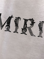 AMIRI Thorn‑Letter Logo Graphic Long‑Sleeve Tee