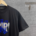 AMIRI Layered Metallic‑Effect Letter Graphic Short‑Sleeve Tee