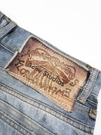 Acne Studios Patchwork Distressed Wide‑Leg Jeans