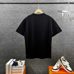AMIRI Overlapping Stacked Letter Logo Crew Neck Short‑Sleeve T‑Shirt
