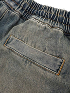 AMIRI Star‑Patch Elastic Waist Wide‑Leg Denim Pants