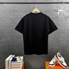 AMIRI Layered Metallic‑Effect Letter Graphic Short‑Sleeve Tee
