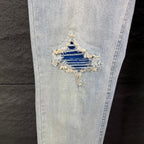 AMIRI Blue Ribbed Patch Diamond‑Rip Distressed Slim‑Fit Denim Jeans