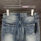 AMIRI Ripped Ribbed Patch Slim‑Fit Denim Jeans