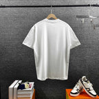 AMIRI MA Logo Riveted Letter Graphic Short‑Sleeve Tee
