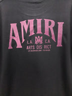 AMIRI Gothic Monogram Chest Graphic Crew Neck Short‑Sleeve T‑Shirt